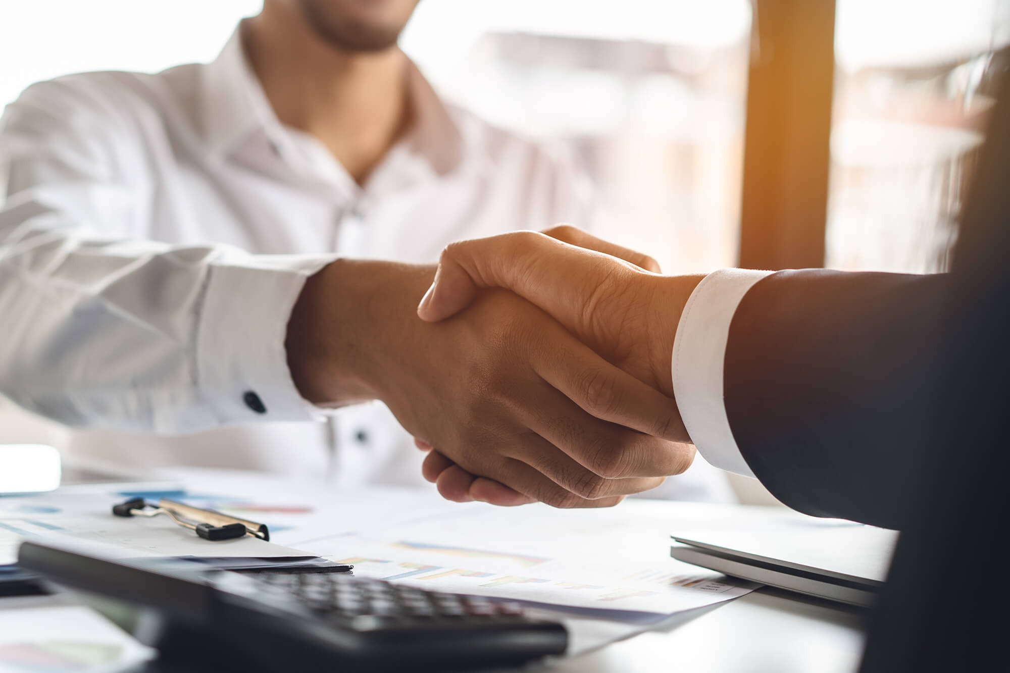 Business people shaking hands